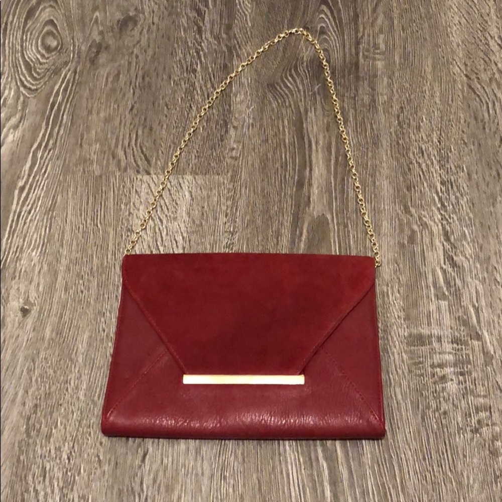 Aldo burgundy clutch w/ removable gold chain strap